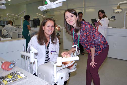Schweitzer Fellow Ljiljana Karan guided ECU nurse-midwifery student Julie Royster in performing a simulated oral examination
