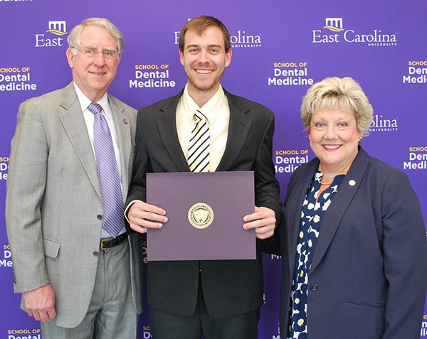 Bryson Rominger ’19 received the American Dental Association Foundation (ADAF) Predoctoral Dental Student Scholarship for the 2017-2018 academic year. Dean Greg Chadwick (at left) and Vice Dean Maggie Wilson were pleased to present Bryson with the scholarship. 