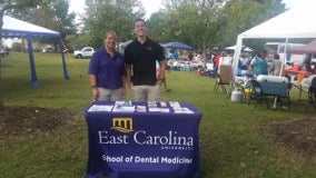 Exercise science students Kristen Harrison and Alex Babineau promoted the ENHANCED program at Latinofest in Greenville this fall.