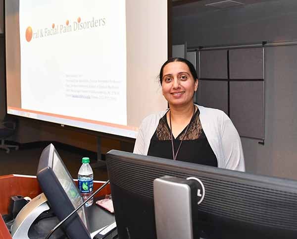 Dr. Amna Hasan spoke about orofacial pain disorders at the Brody School of Medicine’s Grand Rounds.