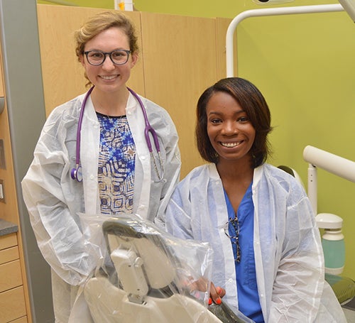 Schweitzer Fellows Kiersten Bethea (at right) and Samantha Forlenza developed a clinic that combined dental and medical services for the homeless.