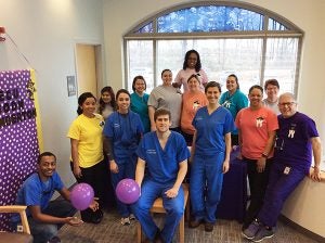 Dr. Craig Slotke (far right) and his team of students, residents and staff in Lumberton provided dental care for children from Deep Branch Elementary School.