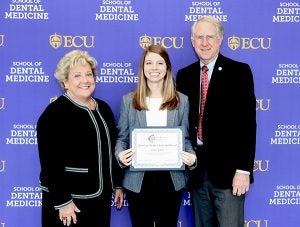 Fourth-year student Emily Wheeler Maltba was chosen by dental faculty to receive a scholarship from the Pierre Fauchard Academy Foundation. Dr. Greg Chadwick, dean of the ECU School of Dental Medicine, and Dr. Margaret Wilson, vice dean, congratulated Emily on the recognition.
