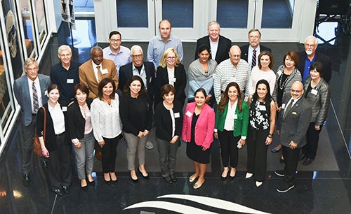 Operative dentistry educators from nine universities discussed issues in common at ECU in October.