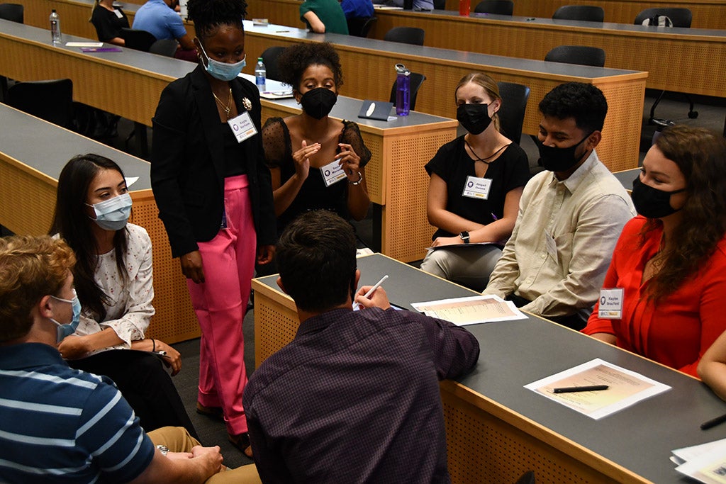 Students sitting at a table.