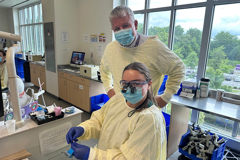 Man and woman in dental clinic.