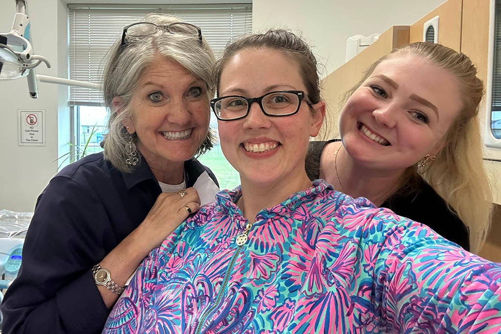 Three women in dental clinic.